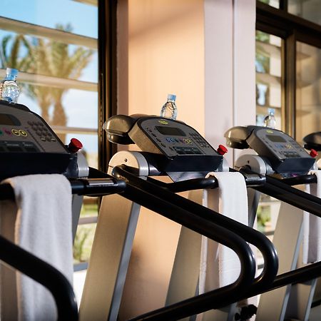 玛拉巴塔丹吉尔瑞享酒店及娱乐场 外观 照片 Treadmills at a gym