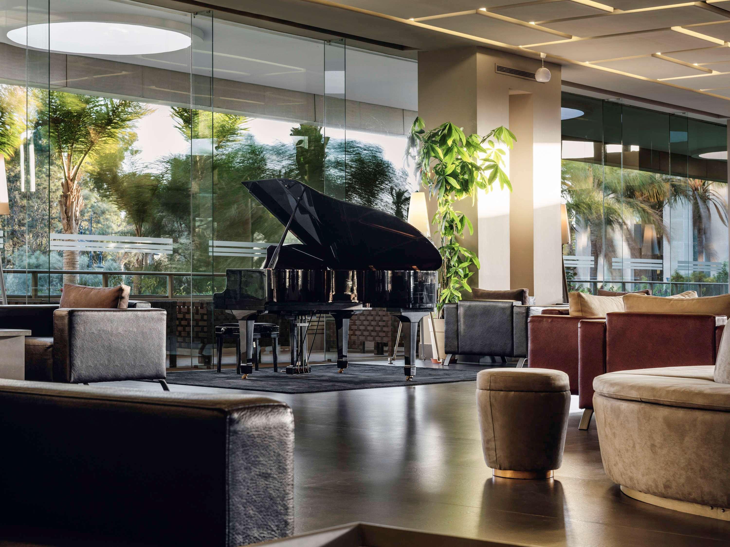 玛拉巴塔丹吉尔瑞享酒店及娱乐场 外观 照片 The lobby of the hotel