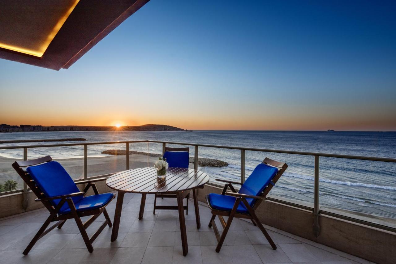 玛拉巴塔丹吉尔瑞享酒店及娱乐场 外观 照片 Sunset at the beach